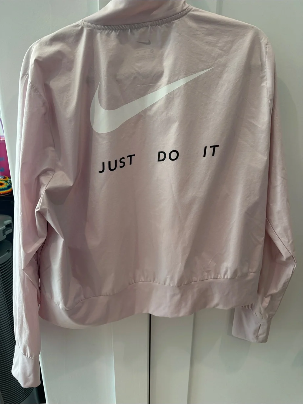 Nike Women's Light Pink windbreaker Jacket with Swoosh